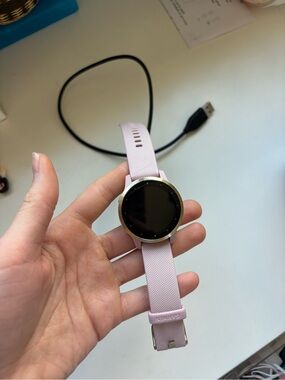 garmin Pink Silicone Band Fitness Smartwatch with Gold Bezel